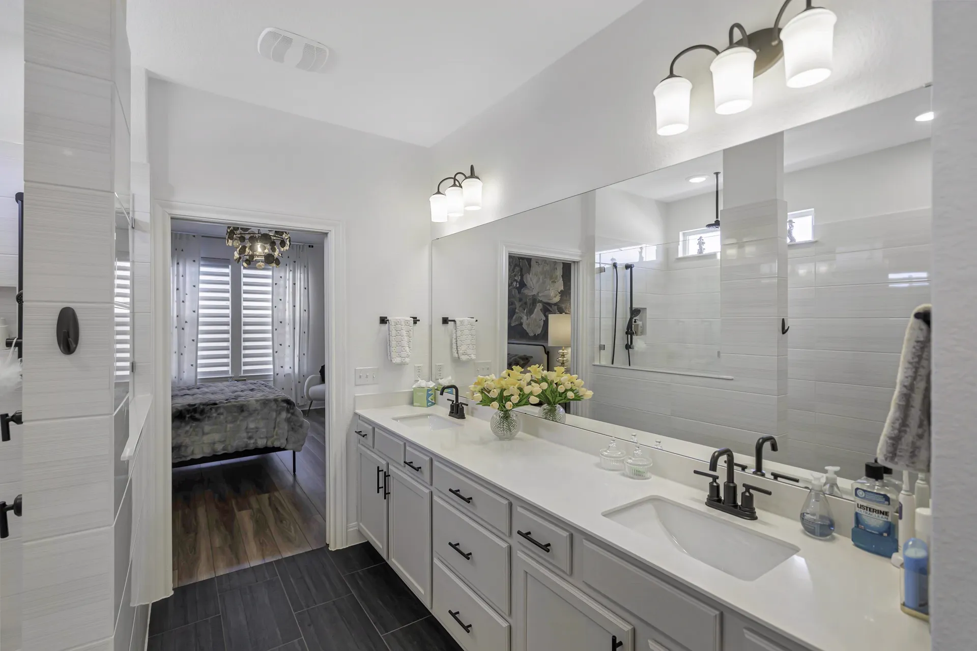Primary bathroom — spacious layout with natural light